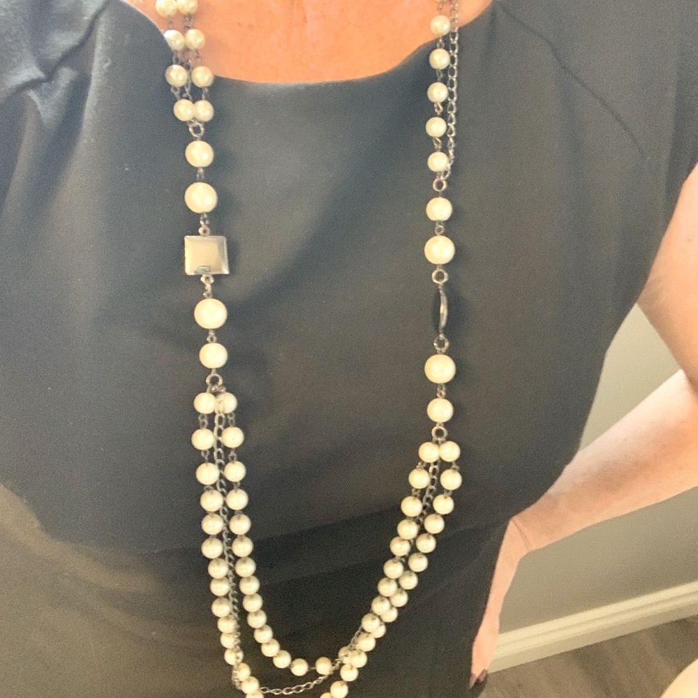 Faux pearl long necklace.